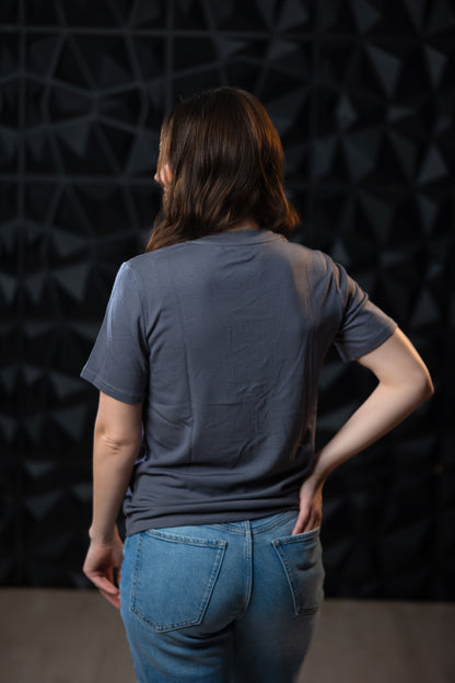 Woman wearing grey EMF blocking t-shirt